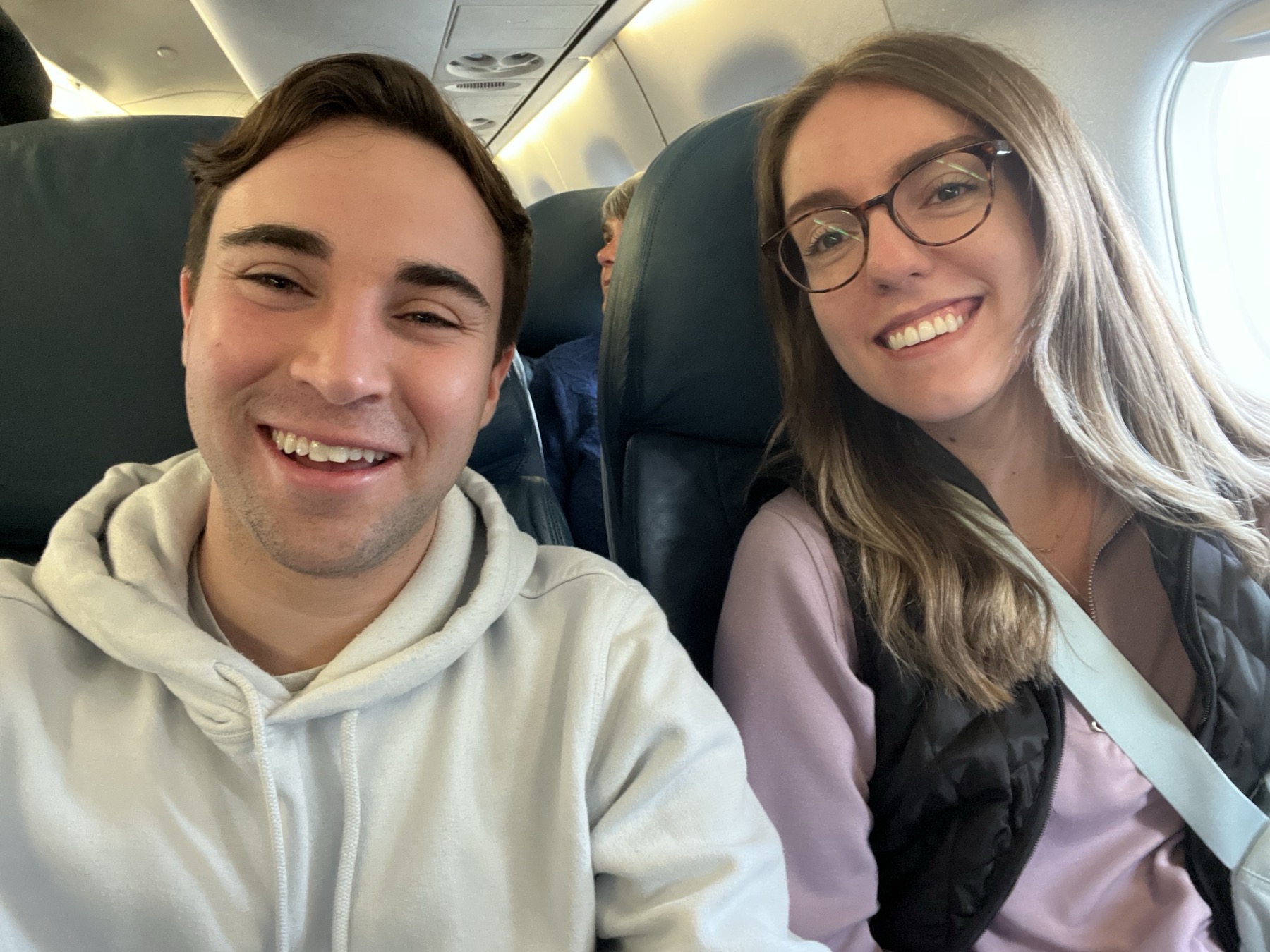 Caitlin and Paul on a flight together, early trip-planning era