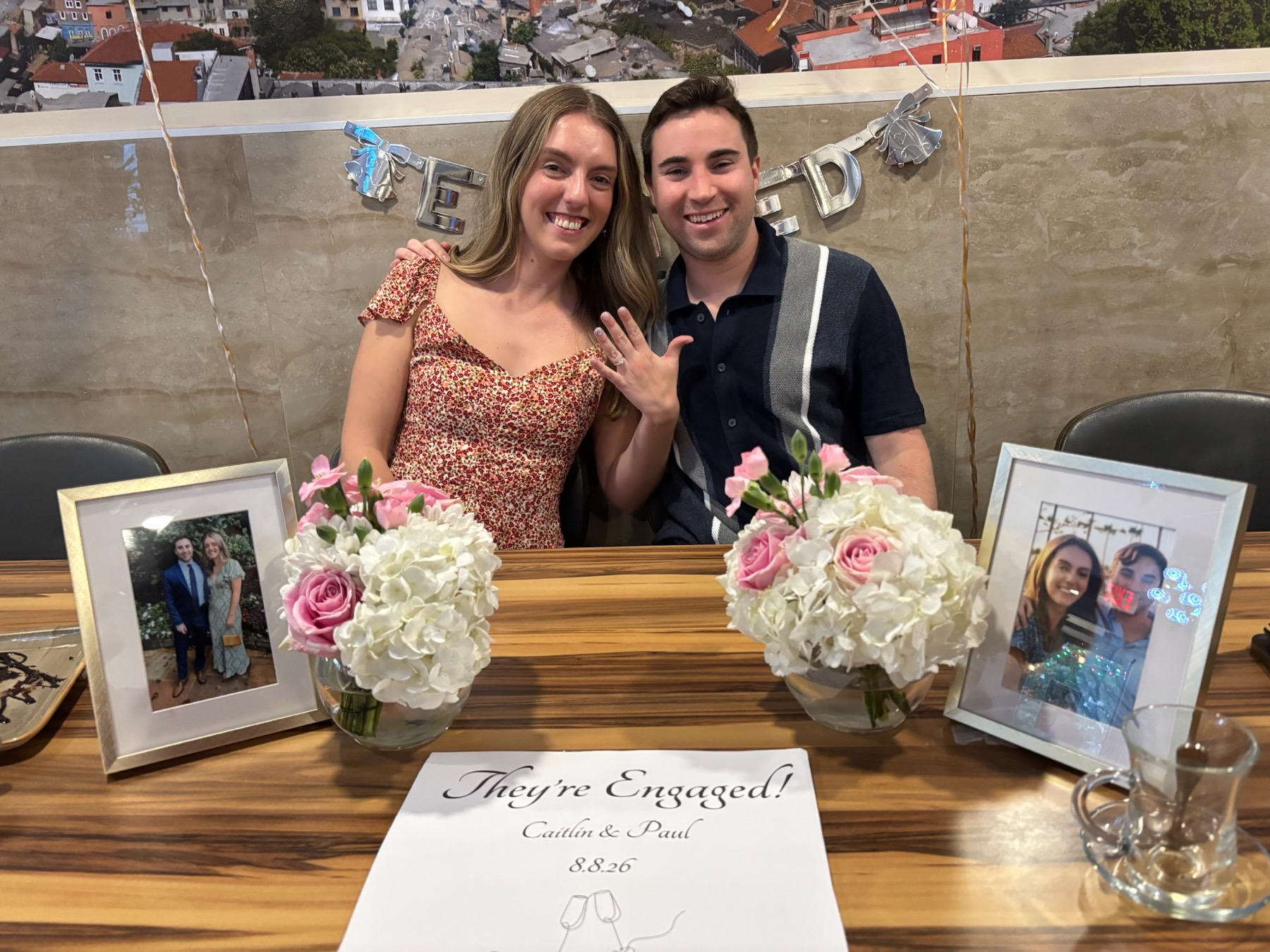 Caitlin and Paul celebrating their engagement