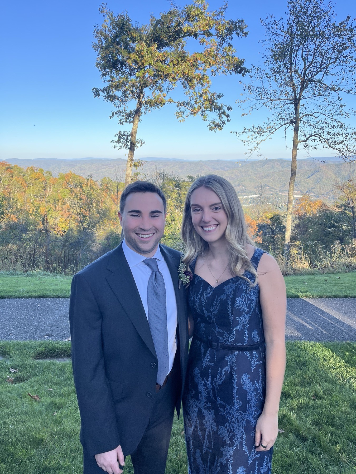 Caitlin and Paul dressed up for a friend's wedding
