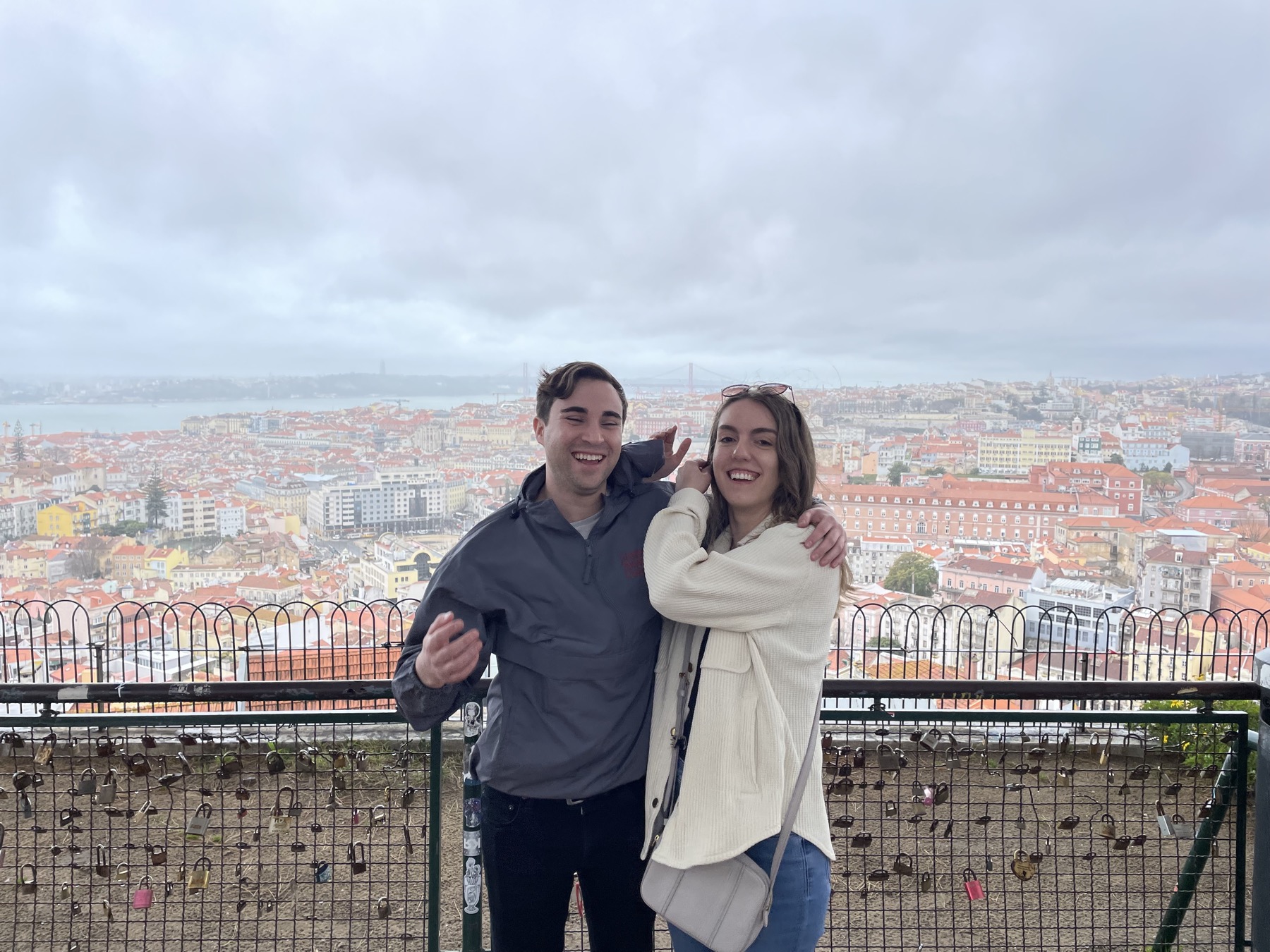 Caitlin and Paul overlooking Lisbon's rooftops