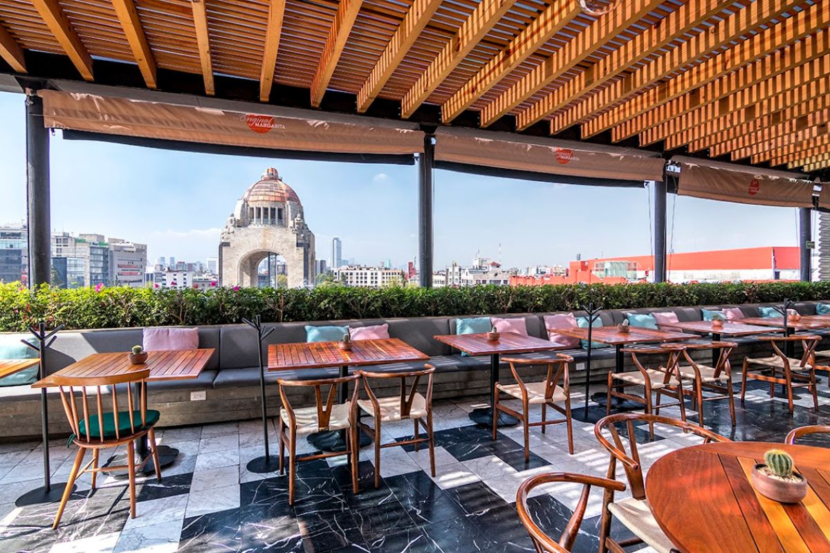 A rooftop terrace overlooking Mexico City